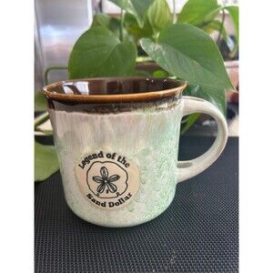 Legend of the Sand Dollar Ceramic Mug Colors Brown Green Cream Size 4” x 4”